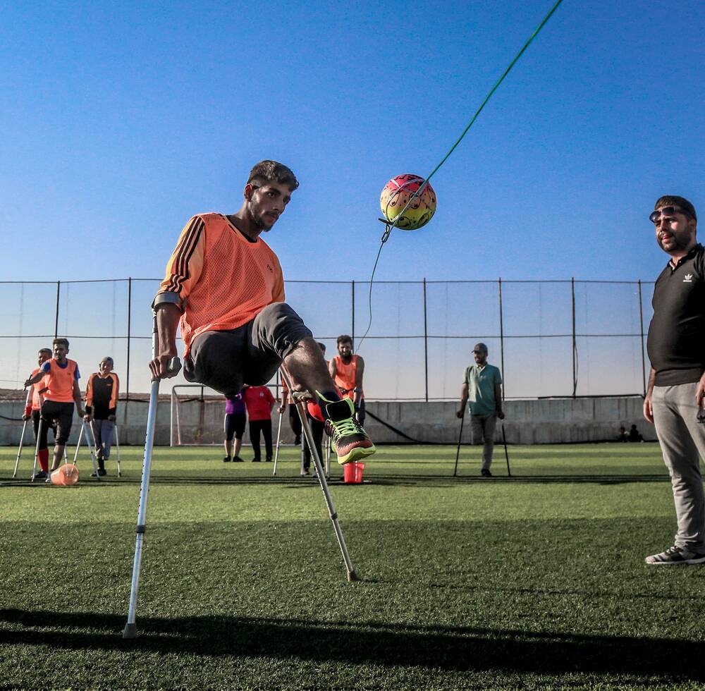 Men and Women Playing Football